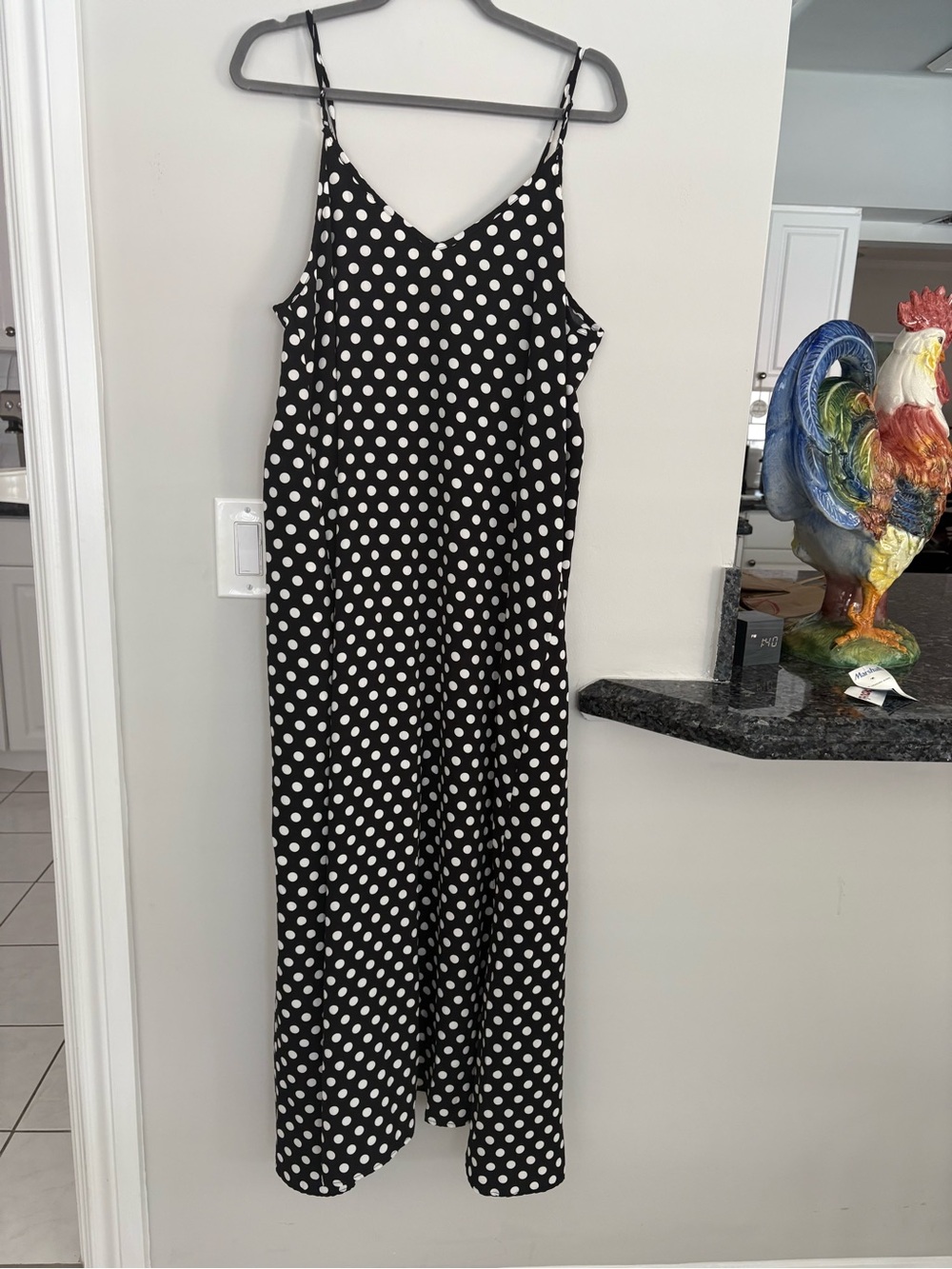 Long flowing black-and-white polkadot slip dress